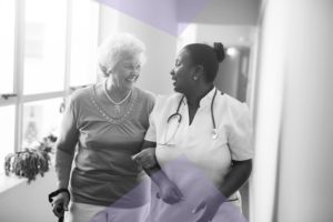Nurse and resident in a care home